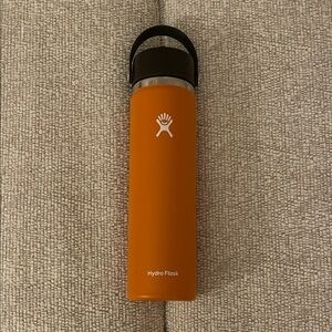 NWOT Hydro Flask Orange Bottle with Black Handle